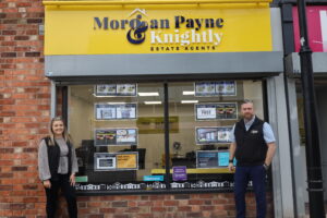 Staff standing outside Morgan Payne & Knightly Estate Agents