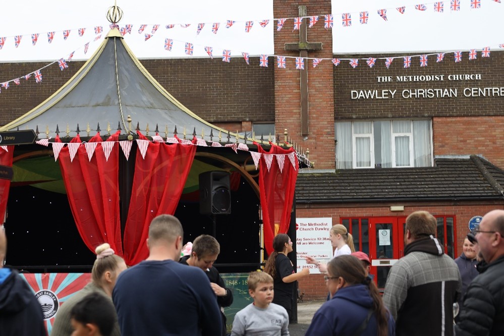 Visitors enjoying live music at the bandstand from last years Dawley Day