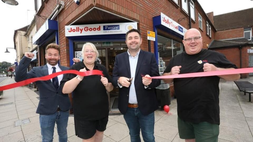 Cllr Ian Preece, Ros Jolly, Cllr Shaun Davies and Brian Jolly cutting the ribbon to their shop located on the High Street.