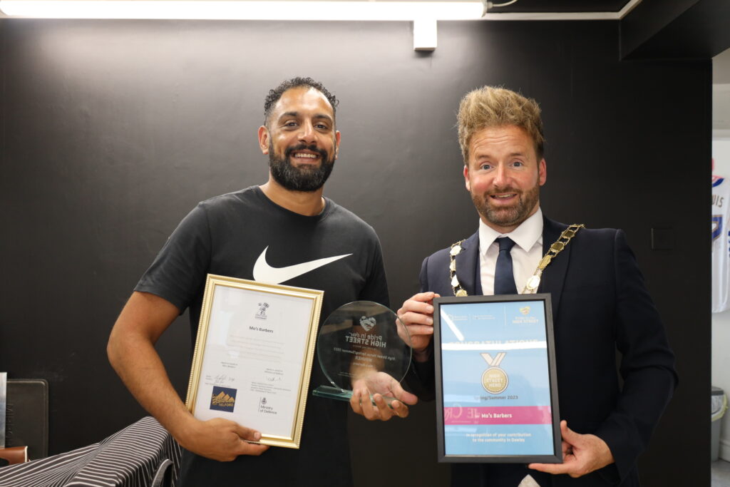 Mo's Barbers receiving their Armed Forces Covenant certificate by Cllr Ian Preece, Mayor of Great Dawley