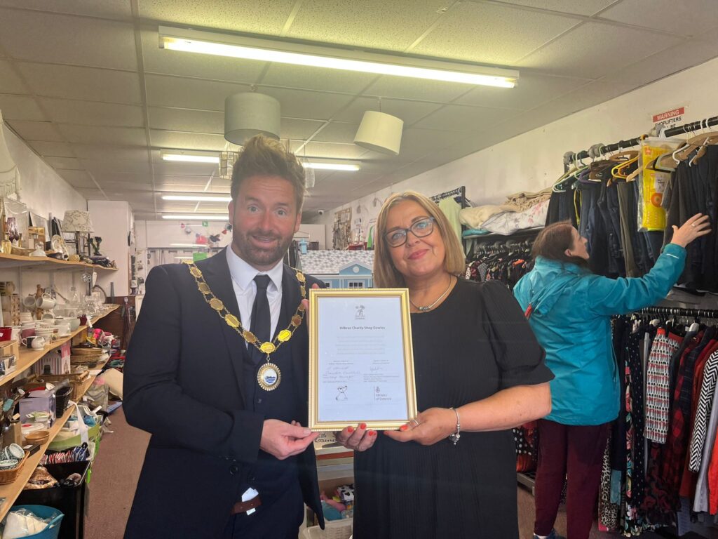Hilbrae Charity Shop receiving their Armed Forces Covenant certificate by Cllr Ian Preece, Mayor of Great Dawley