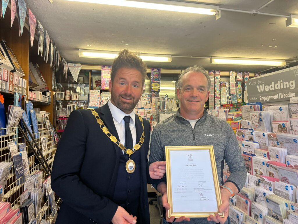 The Card Shop receiving their Armed Forces Covenant certificate by Cllr Ian Preece, Mayor of Great Dawley
