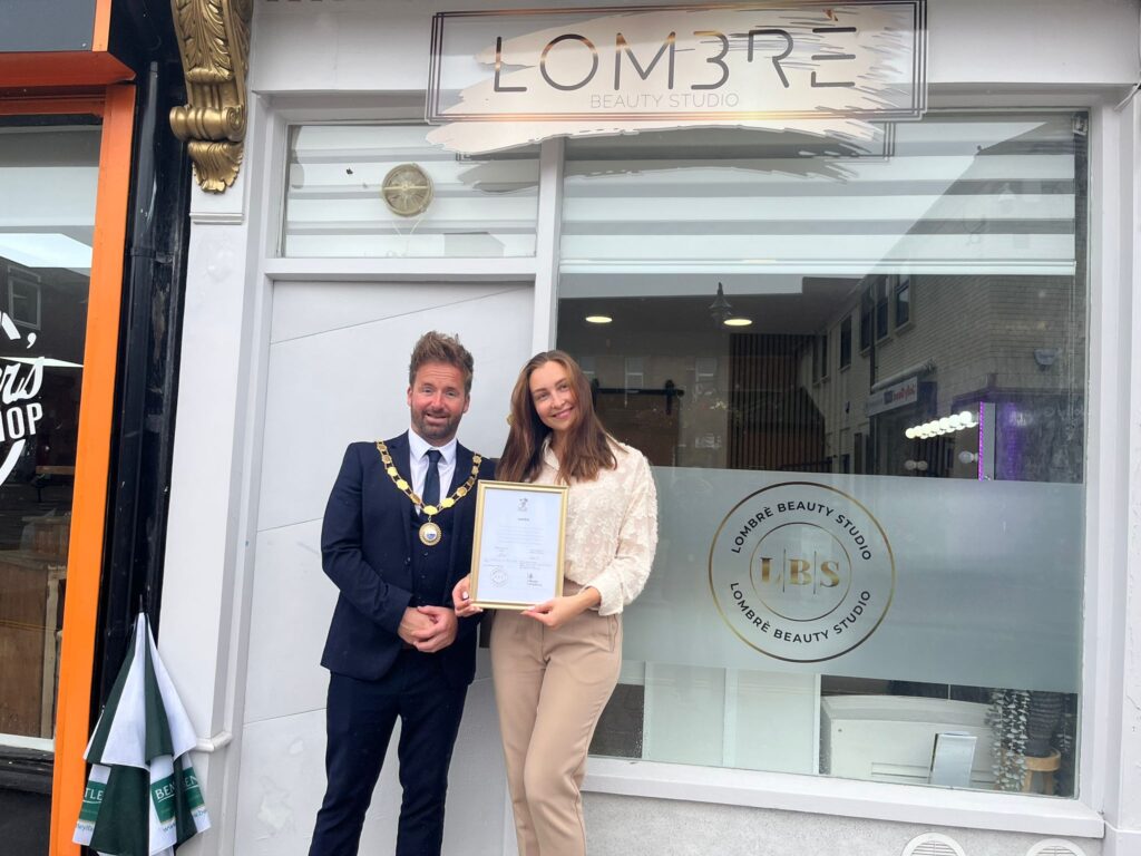 Lombre Beauty Studio receiving their Armed Forces Covenant certificate by Cllr Ian Preece, Mayor of Great Dawley