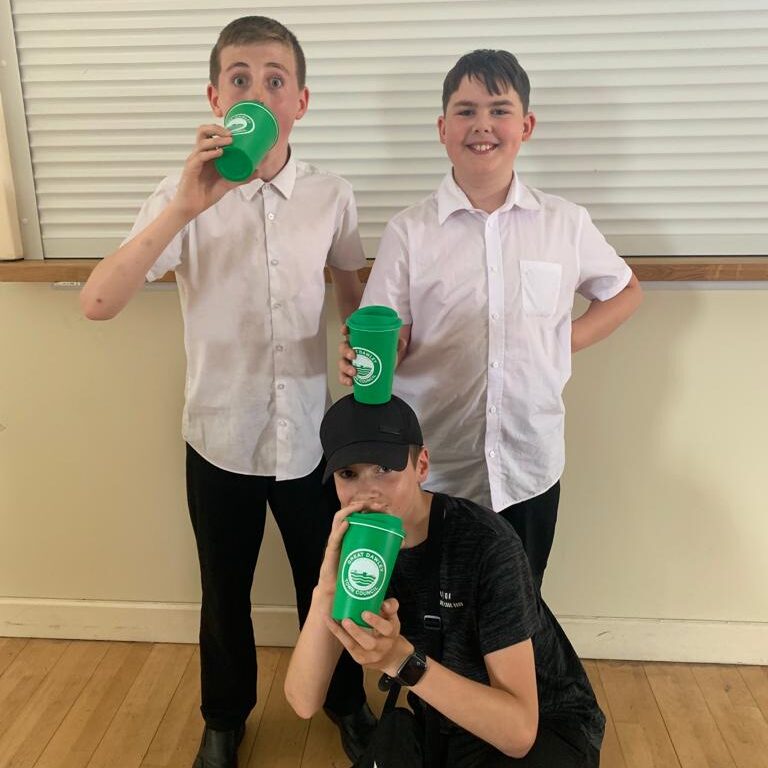 Children from the Great Dawley Youth Club celebrate going plastic free with their new renewable cups.