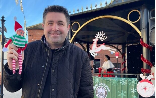 Cllr Shaun Davies, Chair of Great Dawley Town council with Jock-E-Lass, The Great Dawley Christmas Elf