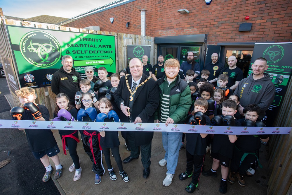 Cllr Ben Carter, Borough Cllr and Cabinet Member for Economy, Cllr Ollie Vickers, along with members at Trinity Martial Arts, opening the new club in Dawley